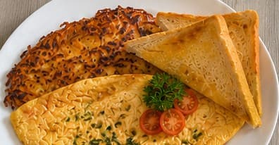 Hanover Three-Egg Omelet with potato rösti, cherry tomatoes and toast